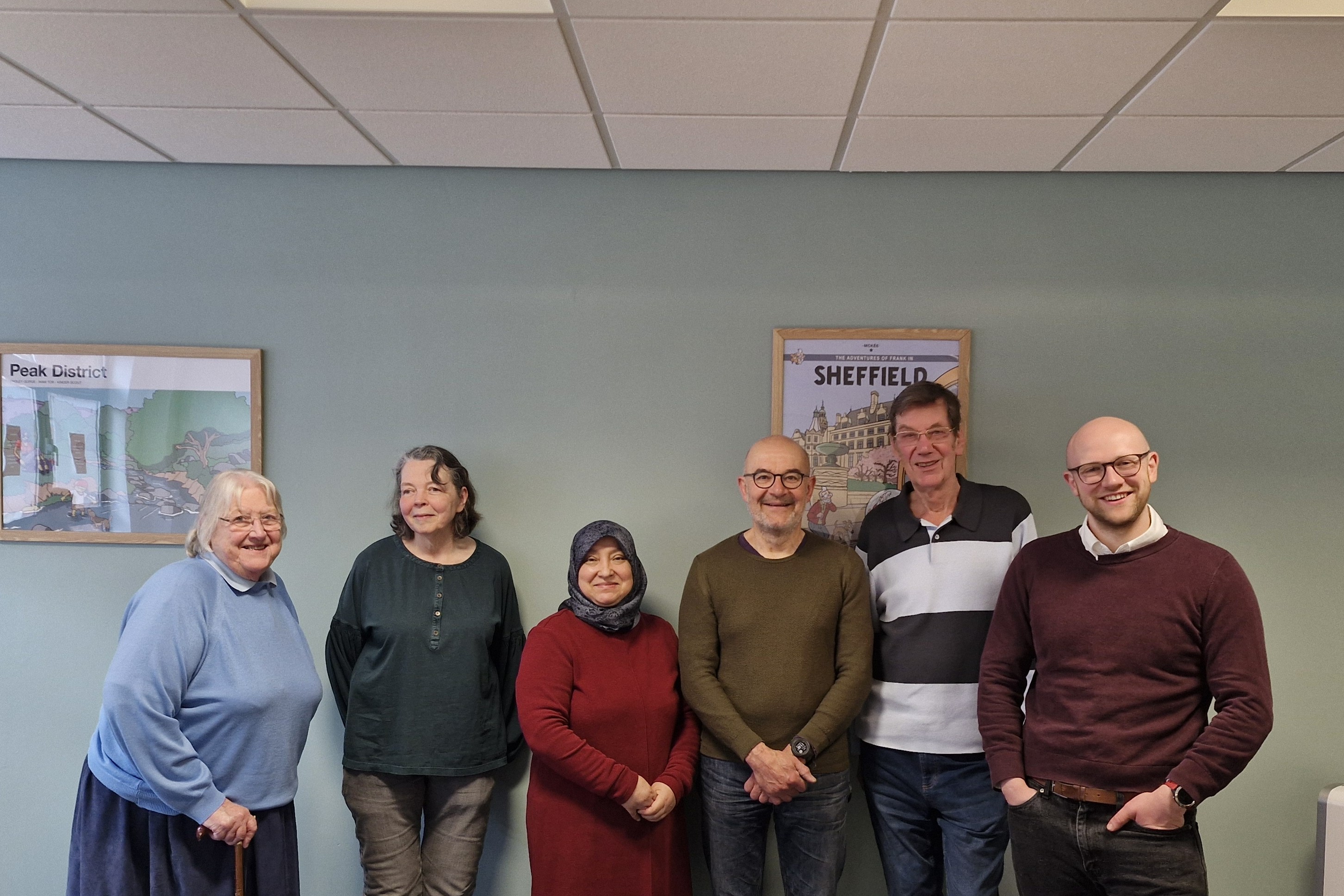 Group photo of six Strategic Advisory Group members