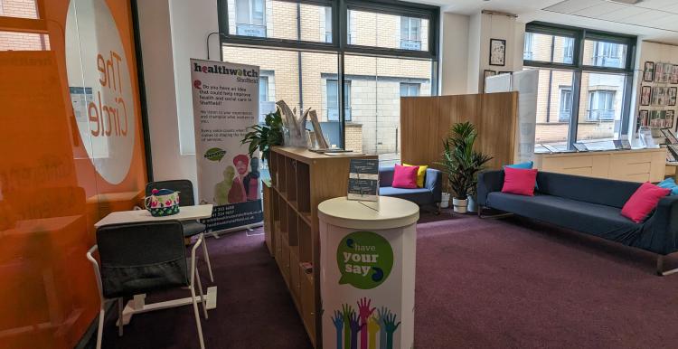 Photo of the Healthwatch Hub located on the ground floor of the Circle; the photo shows some sofas in the waiting area and the small table used for consultations
