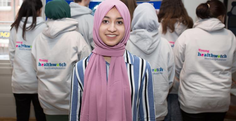 Young volunteer wearing a headscarf