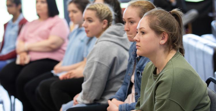 Young people listening in a group 