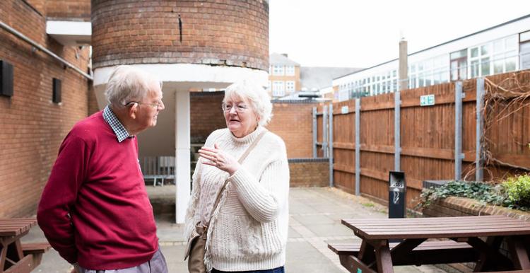 Two people having a discussion