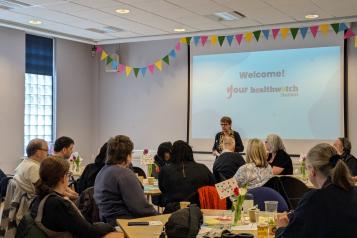 Strategic Advisory Group chair giving speech at Healthwatch Sheffield 10-year contract launch event