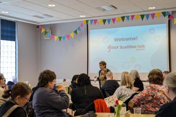 Strategic Advisory Group chair giving speech at Healthwatch Sheffield 10-year contract launch event