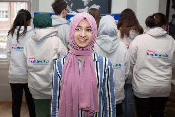 Young volunteer wearing a headscarf