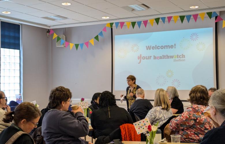 Strategic Advisory Group chair giving speech at Healthwatch Sheffield 10-year contract launch event