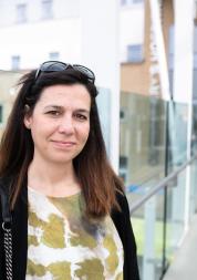 Woman stood outside a hospital