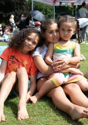 3 children at a picnic
