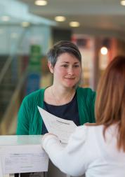 Lady at reception in a health service